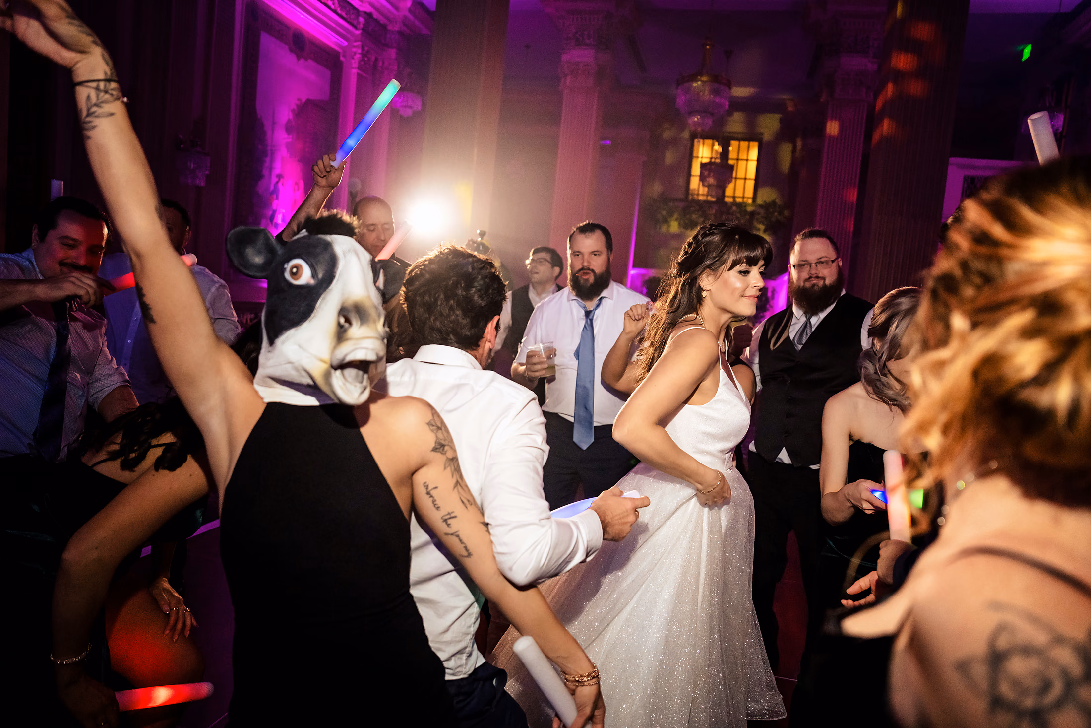 Dip on the dance floor under purple light