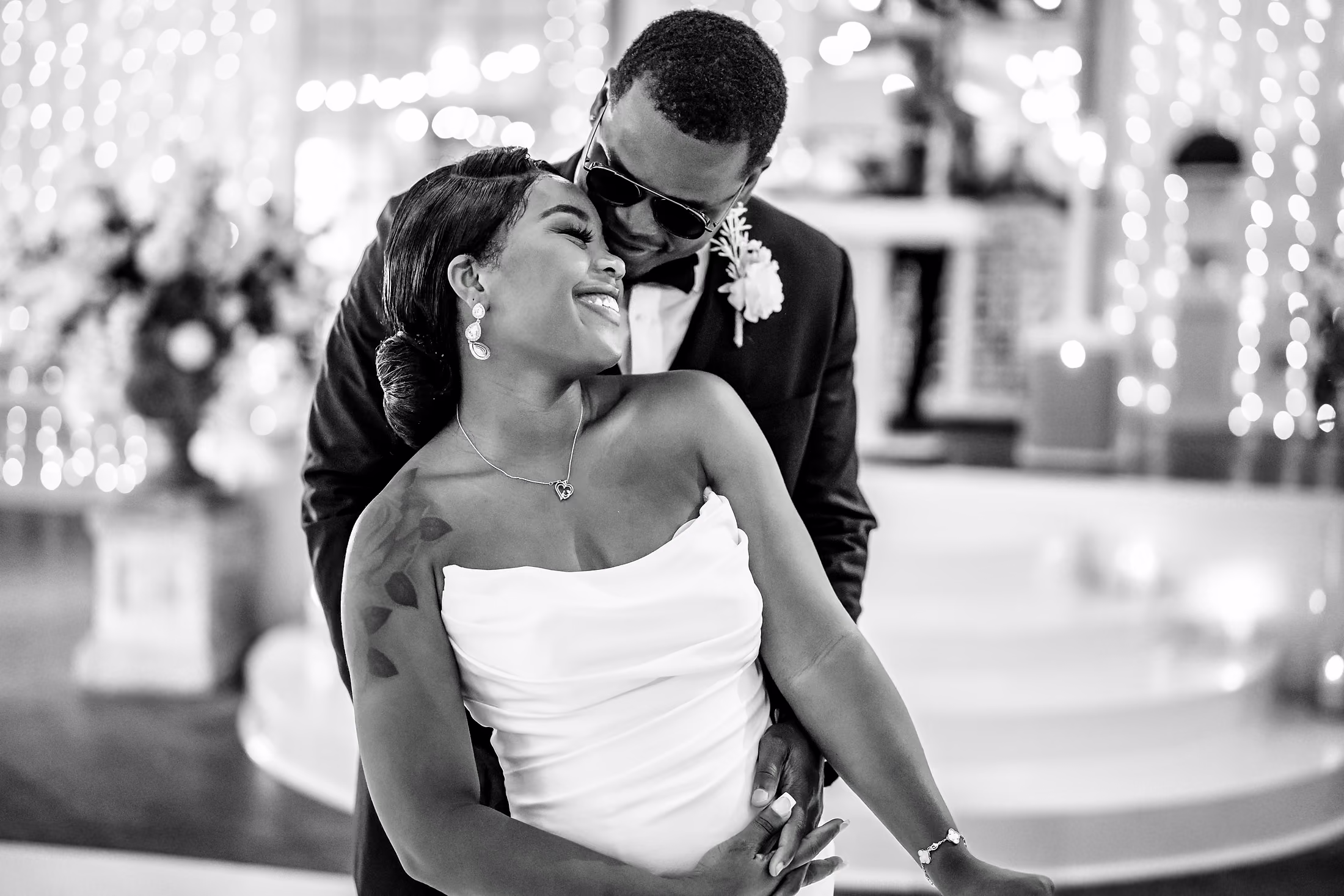 Black-and-white dip kiss on the dance floor