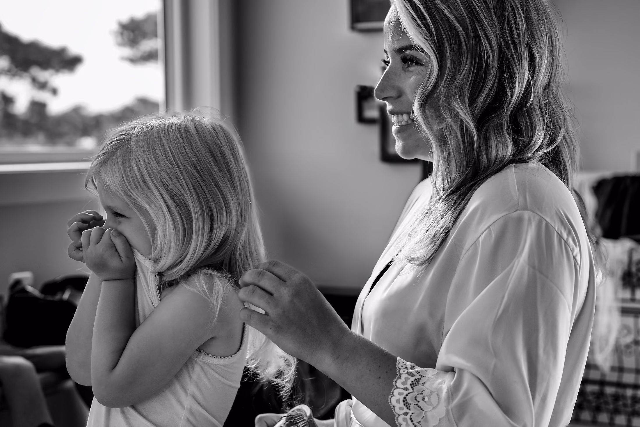 Bride laughing through happy tears