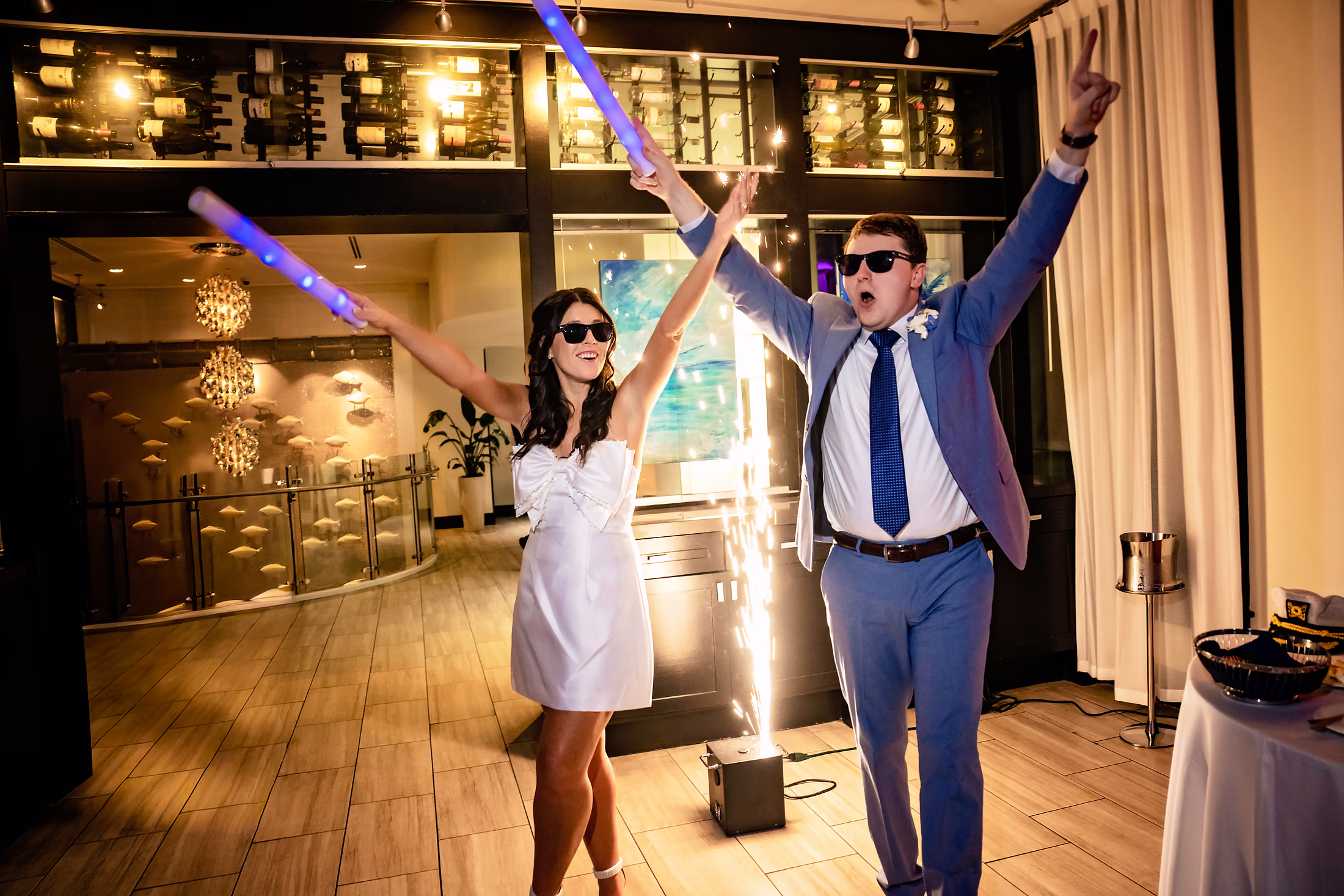 Groom celebrating with arms raised