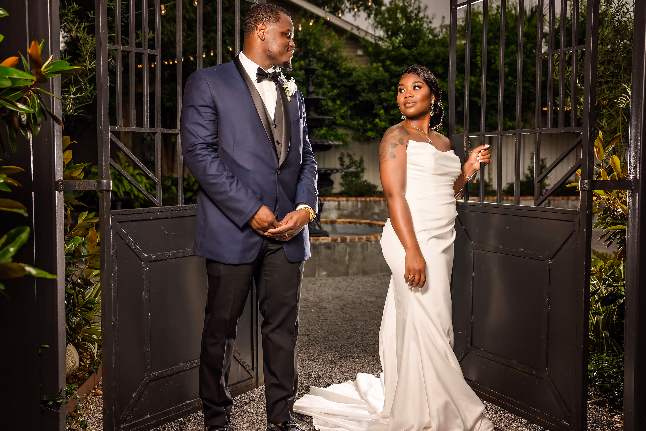 Couple together at the iron gates