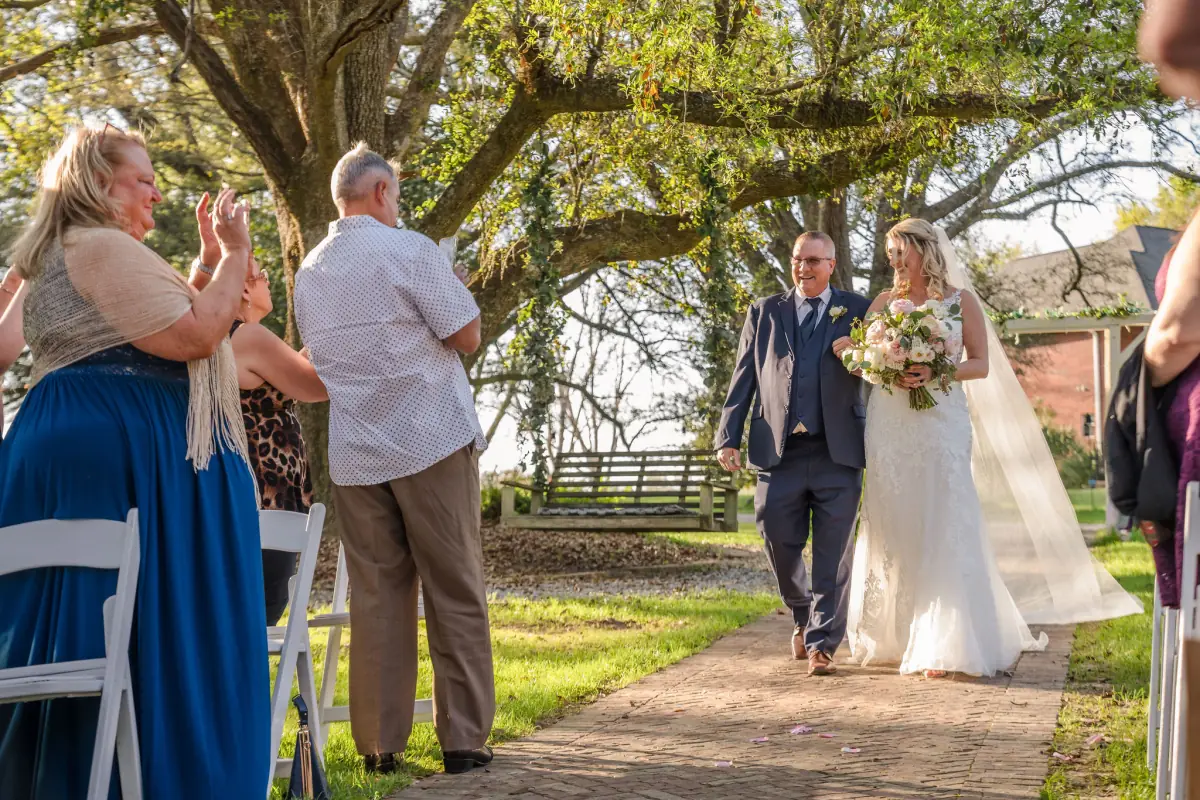 Outdoor ceremony beneath the oak canopy at Live Oak Plantation