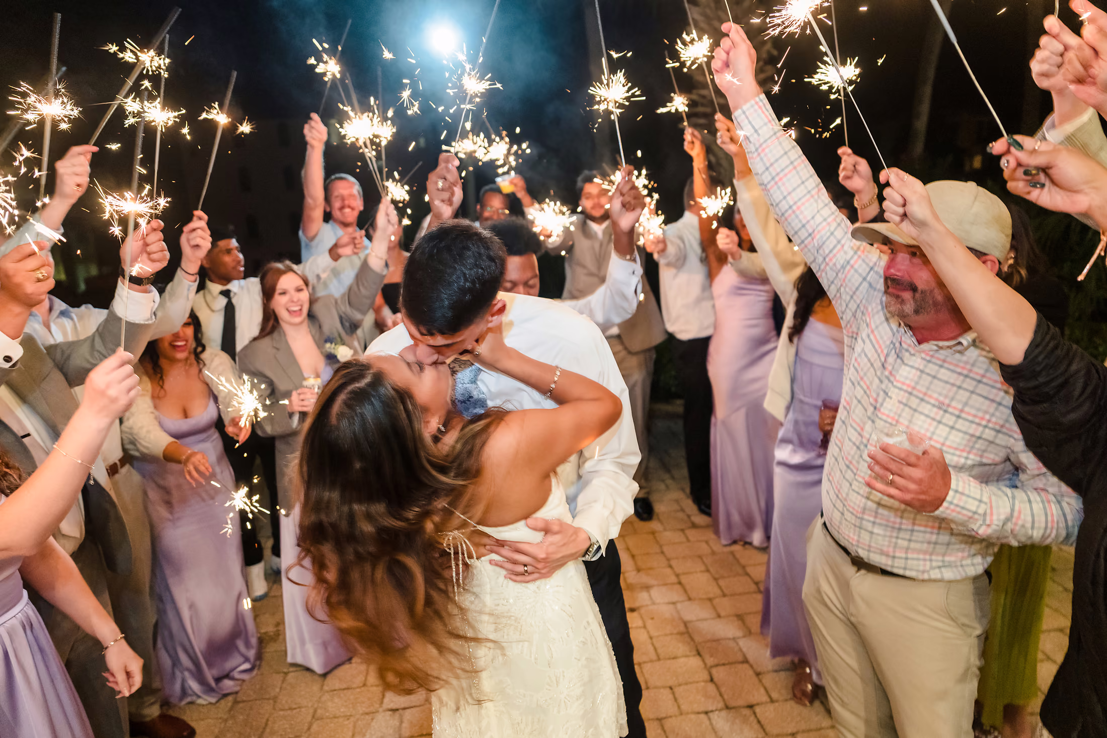 Sparkler send-off down the path at night