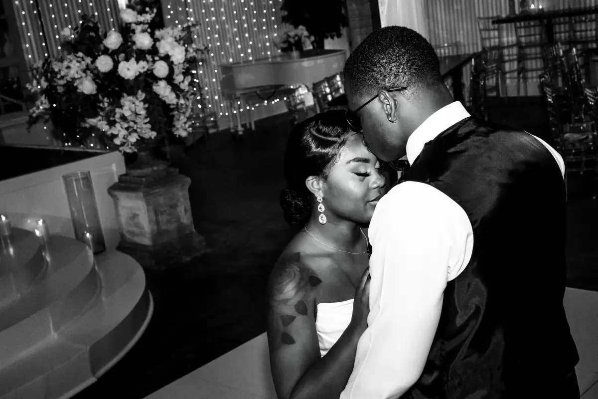 Black-and-white intimate kiss