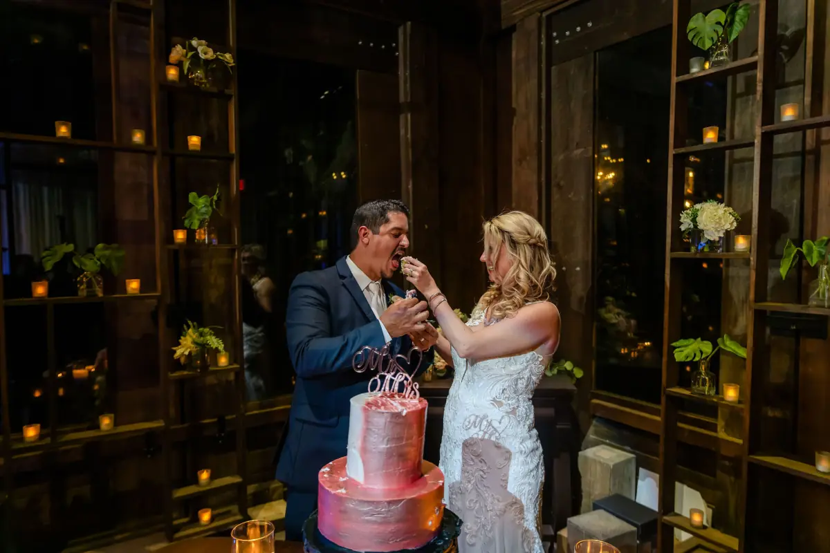 First dance under the candlelit greenery of the Live Oak Plantation barn