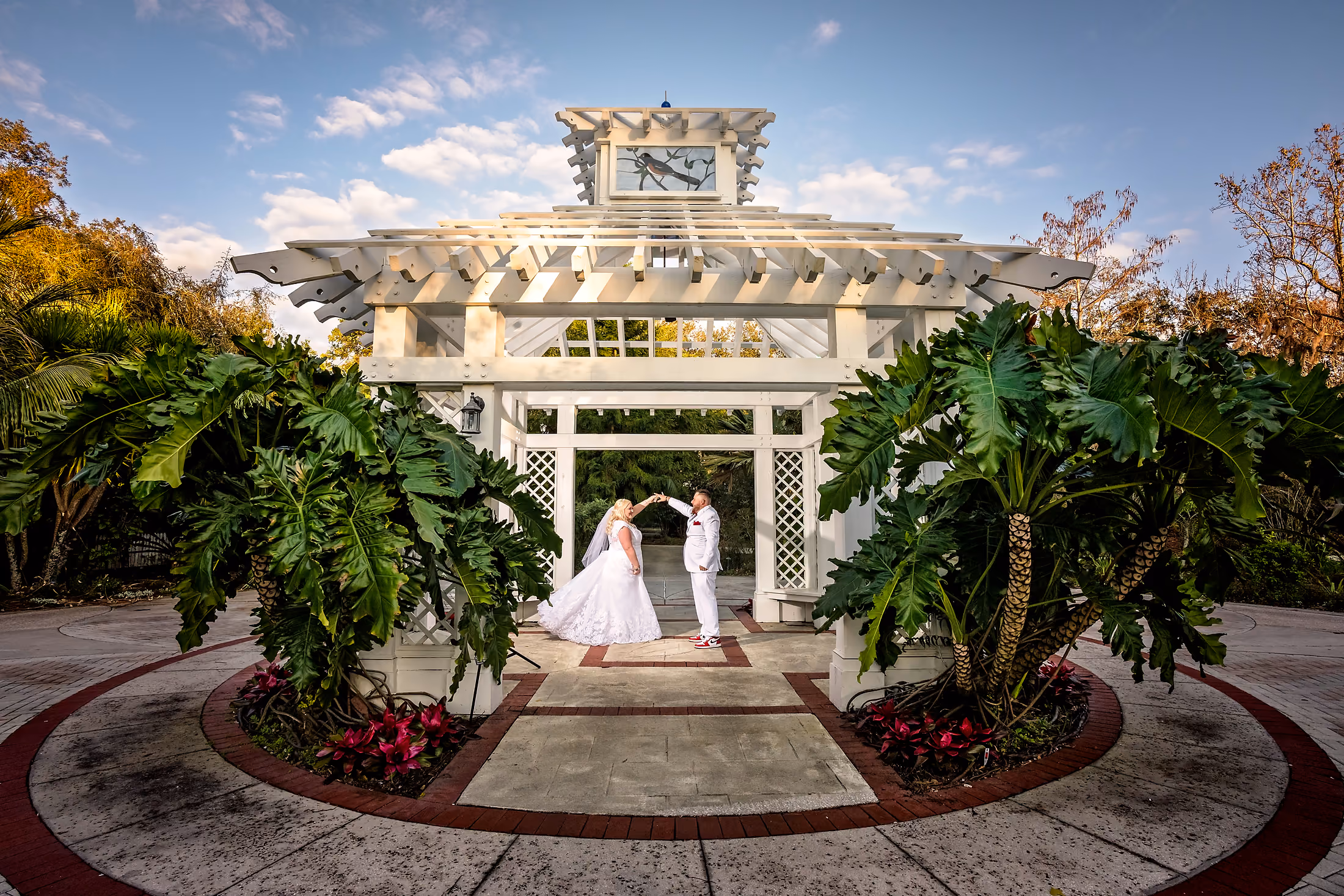 Grand fountain framed by greenery arches
