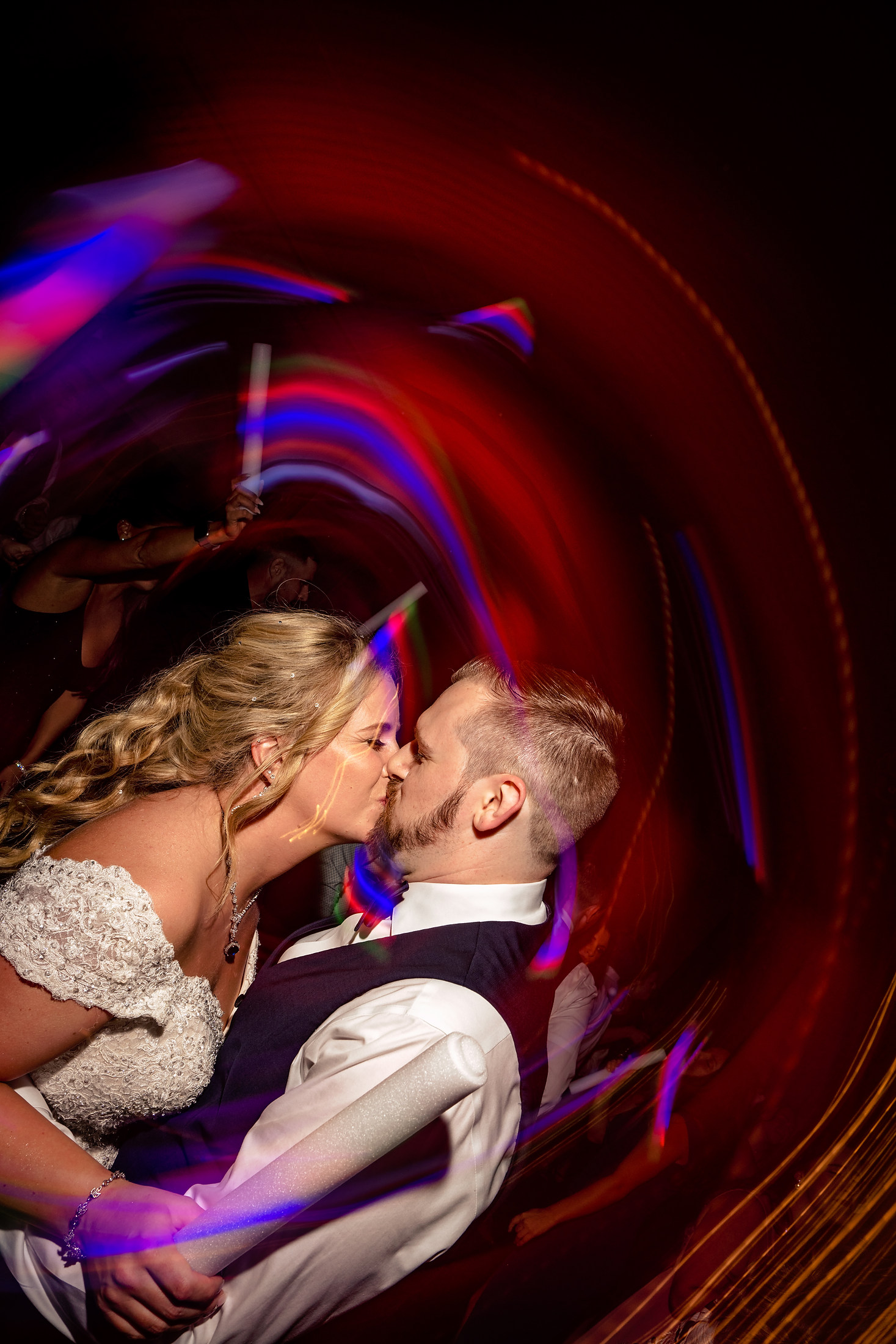 Light-painted kiss in swirling color