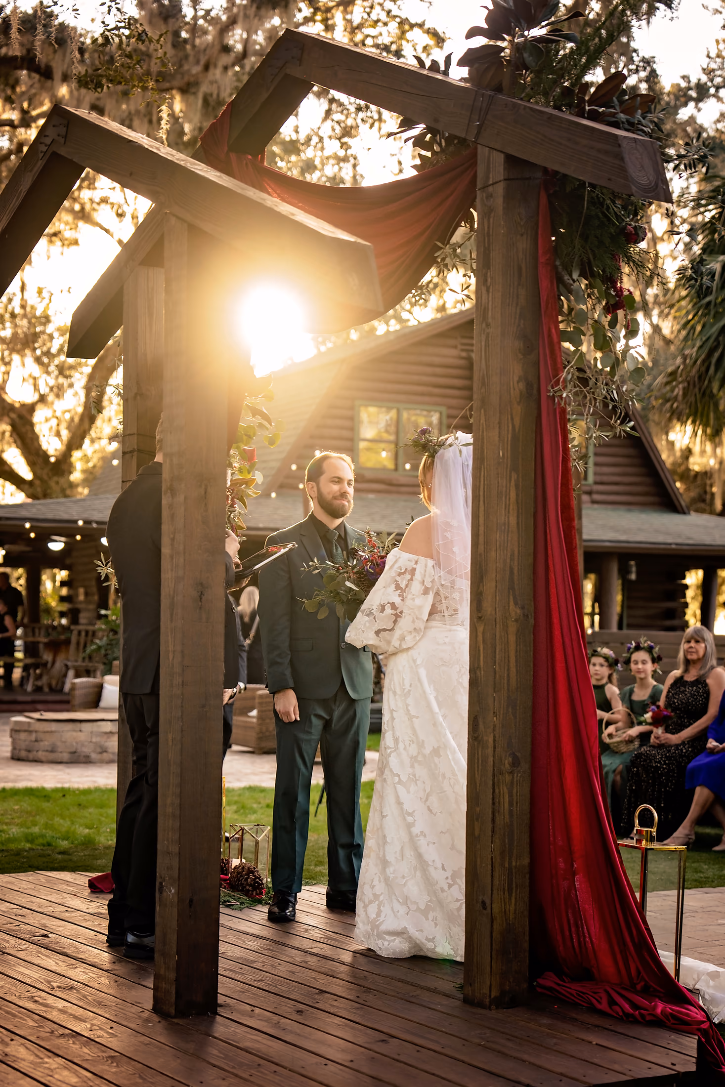 Couple under a lantern-lit pergola at night