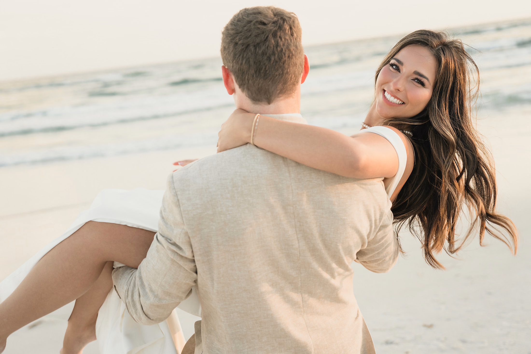 Couple embracing on the beach