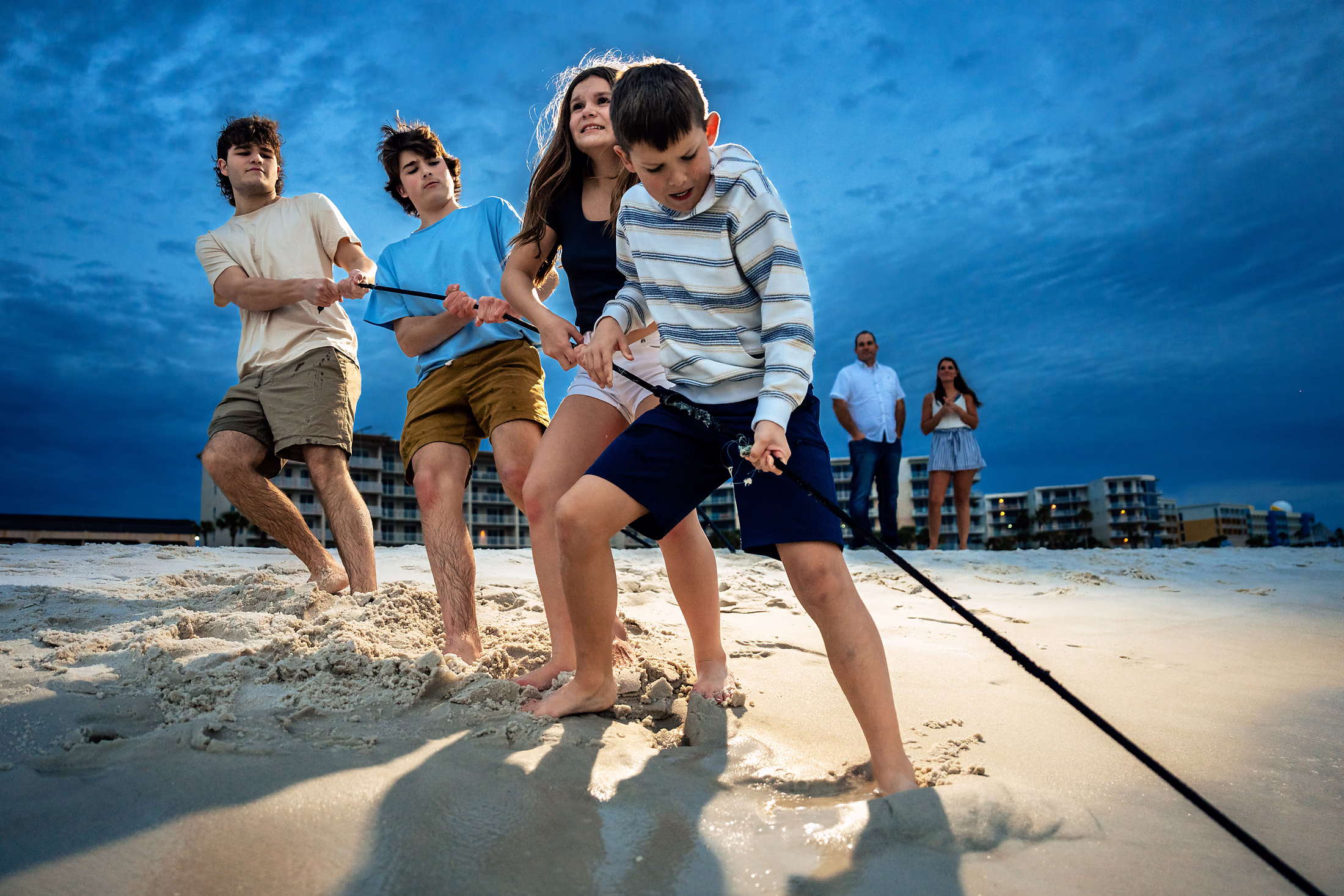 Kids playing together at the water's edge