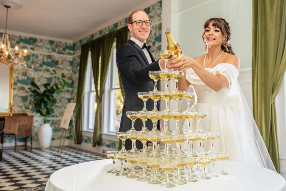 Couple beside the champagne tower on the terrace