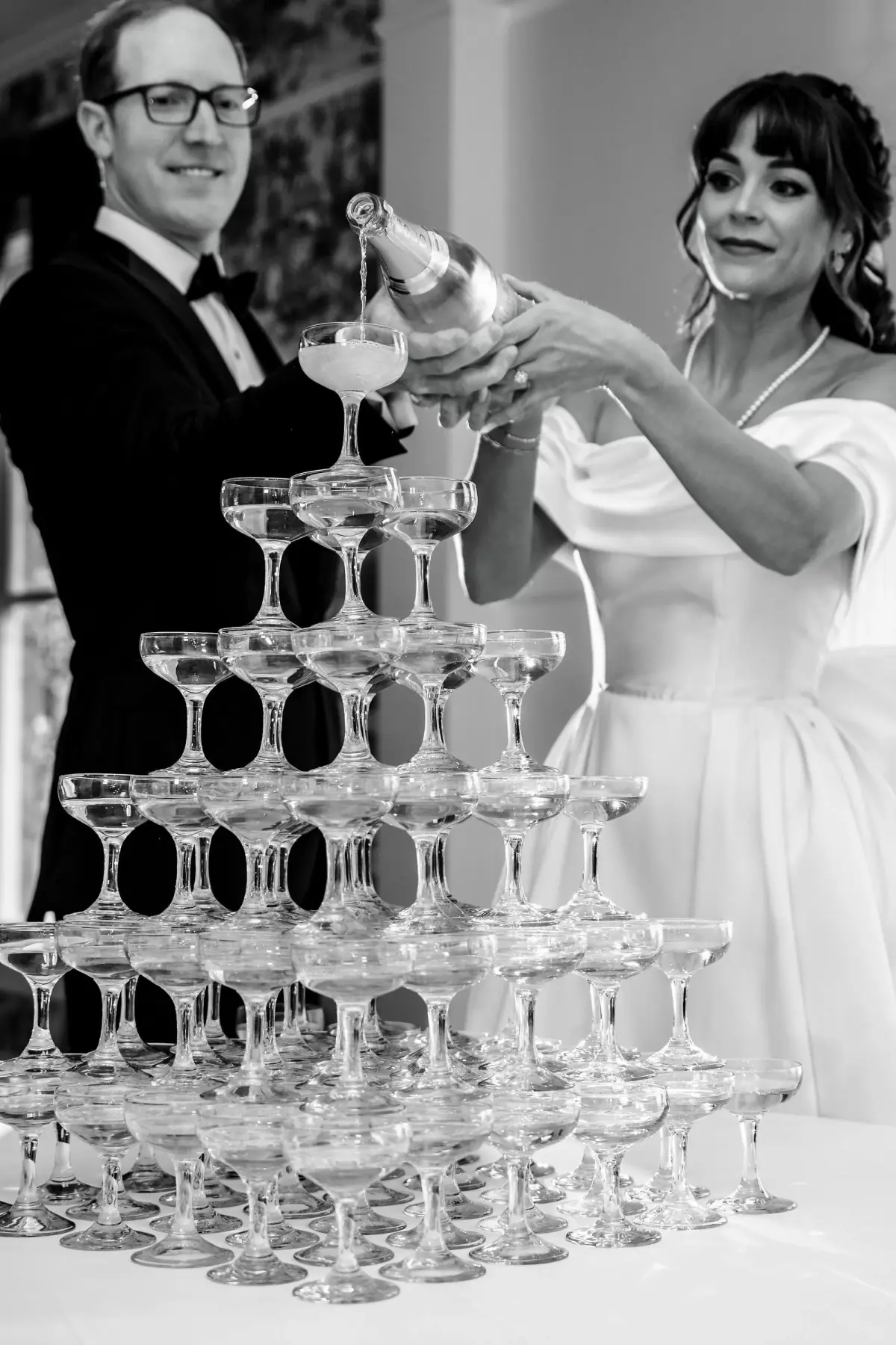 Black-and-white pour over the champagne tower