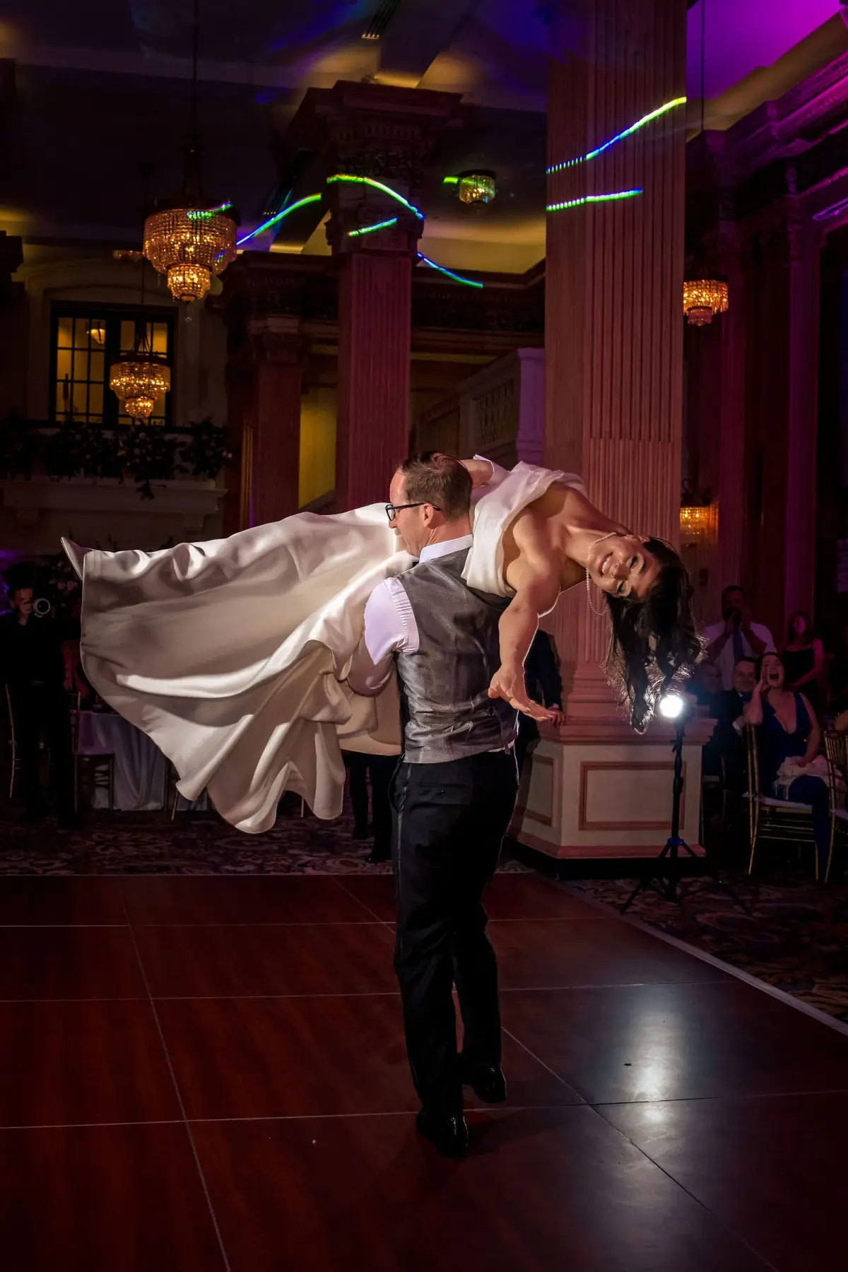 Bride twirling her veil on the dance floor