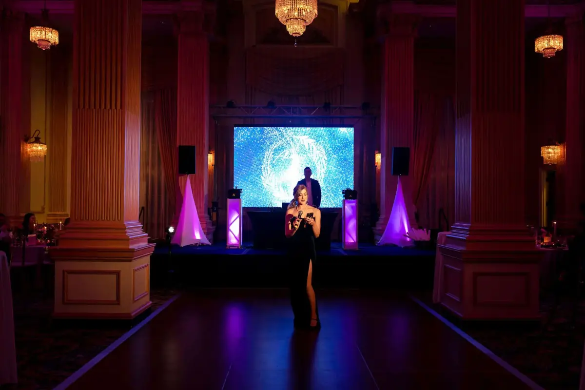 Reception hall washed in pink uplight