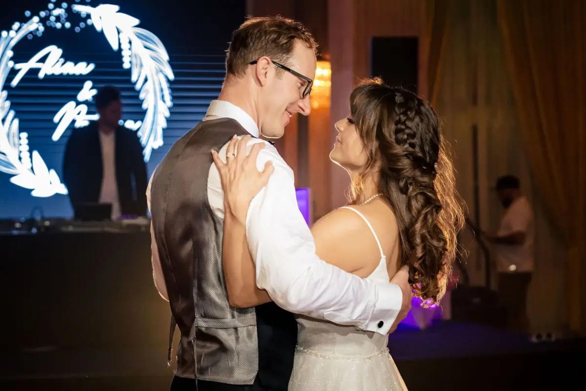 Couple embracing within a ring of light