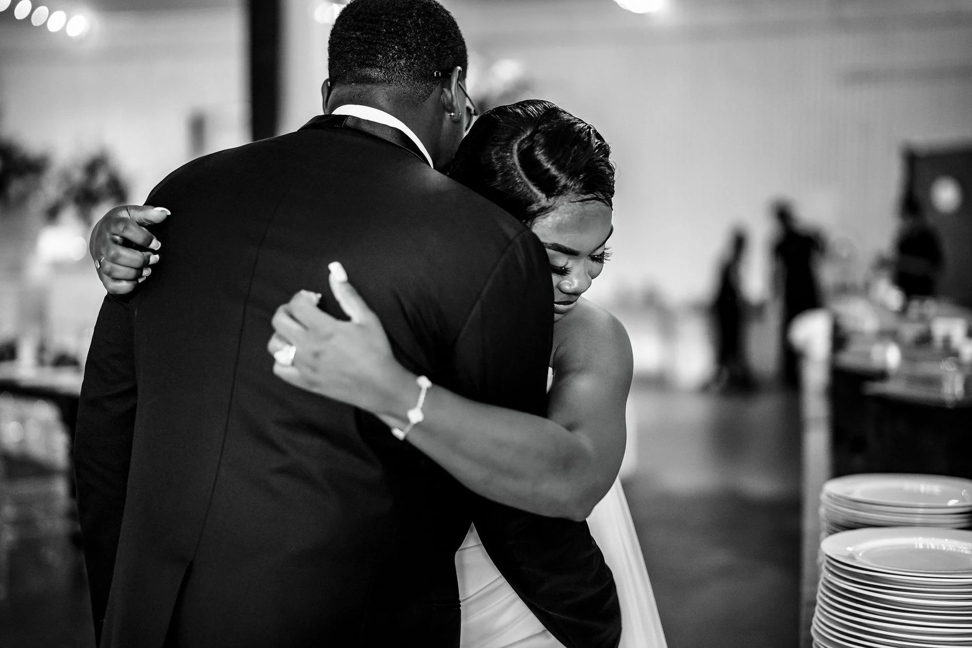 Black-and-white couple dancing close