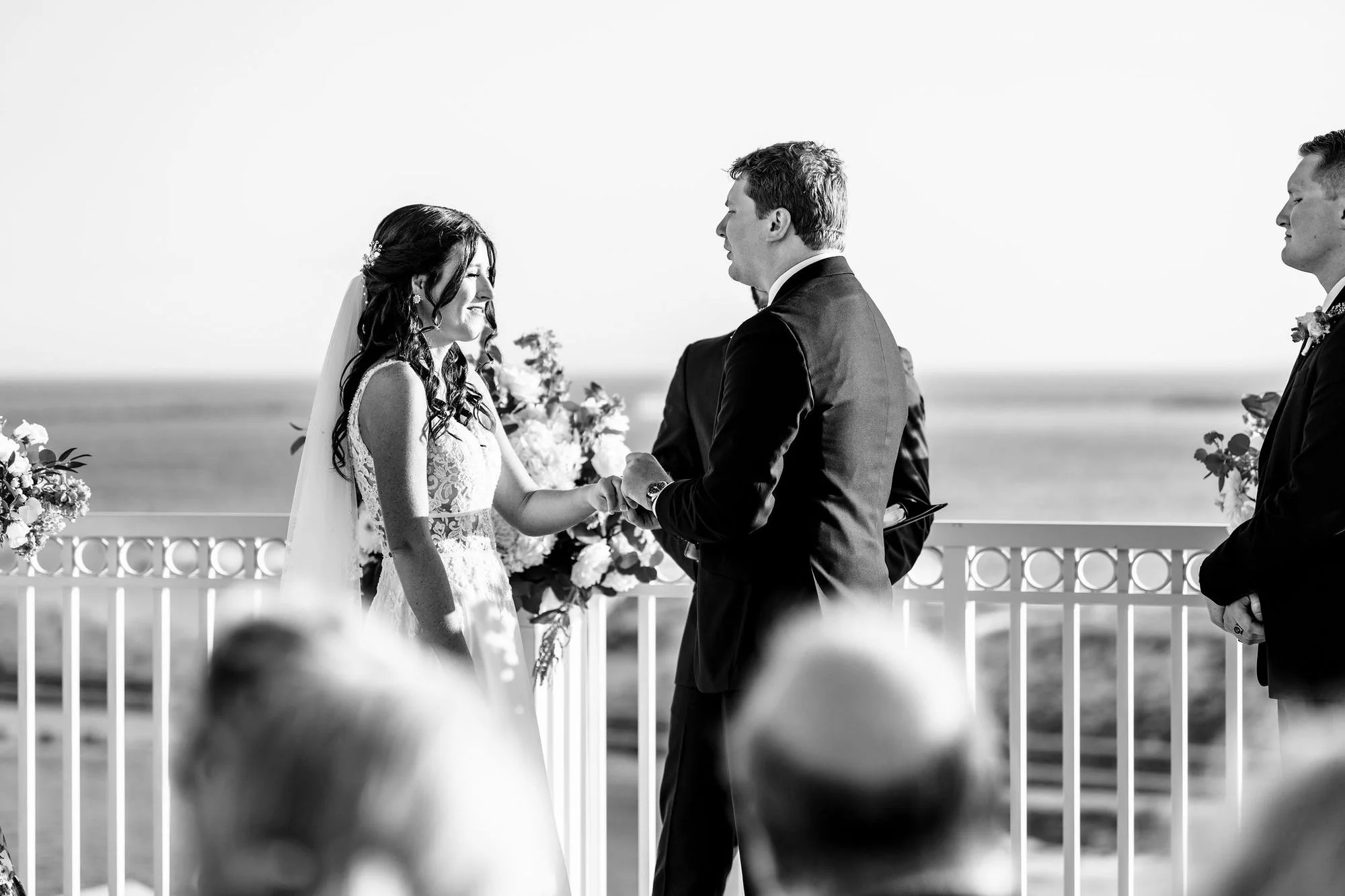 Black-and-white kiss with the wedding party