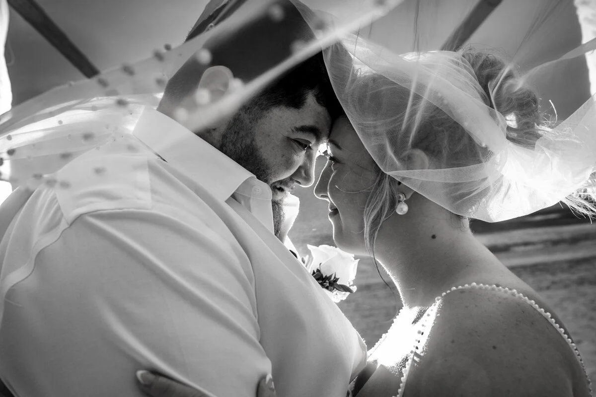 Black-and-white couple swaying close