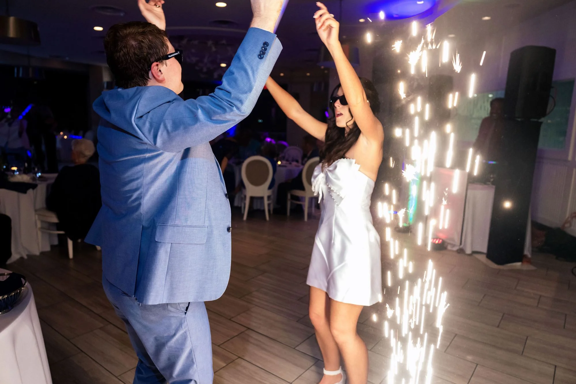 Groom dancing among the sparklers