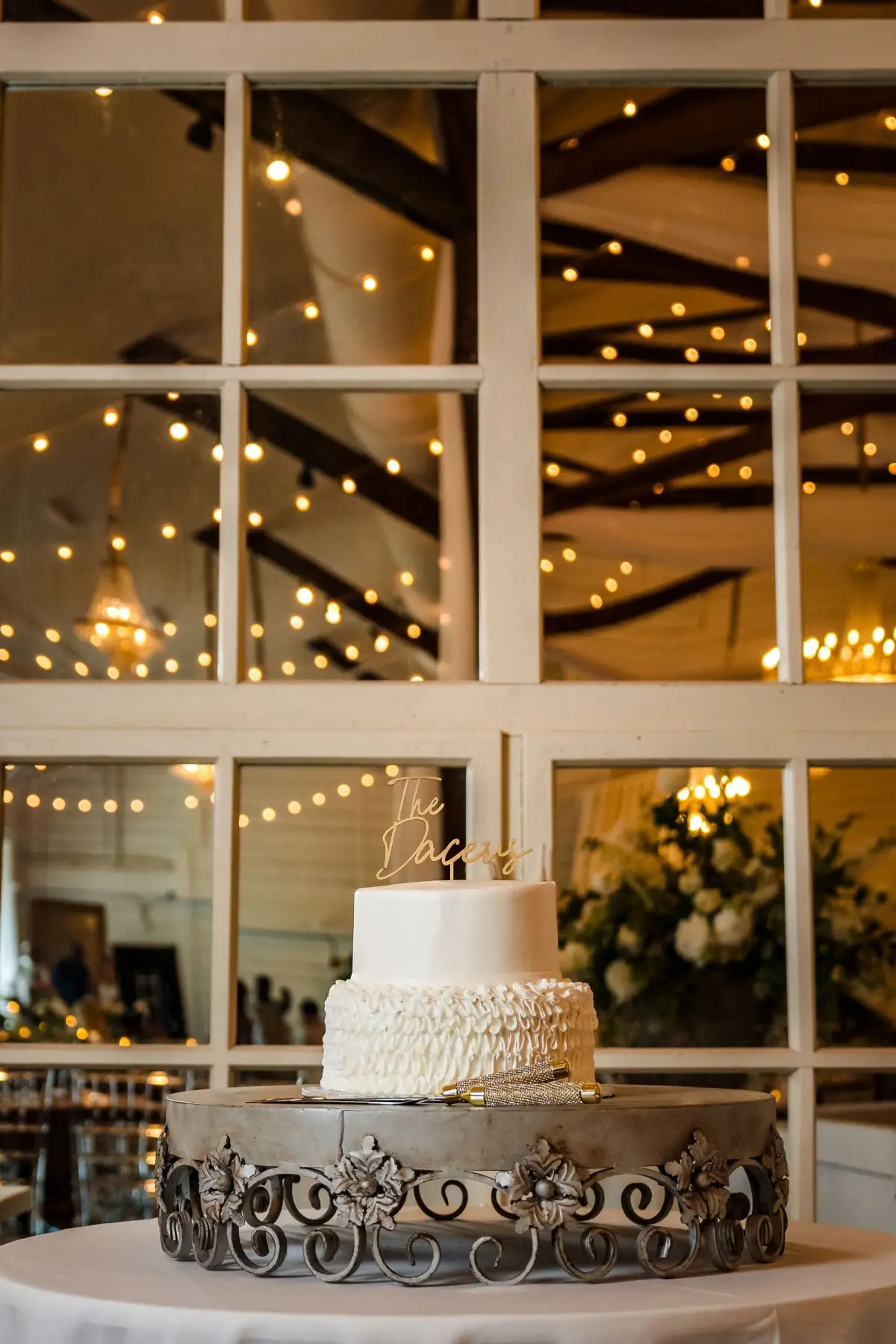 Wedding cake by the barn windows