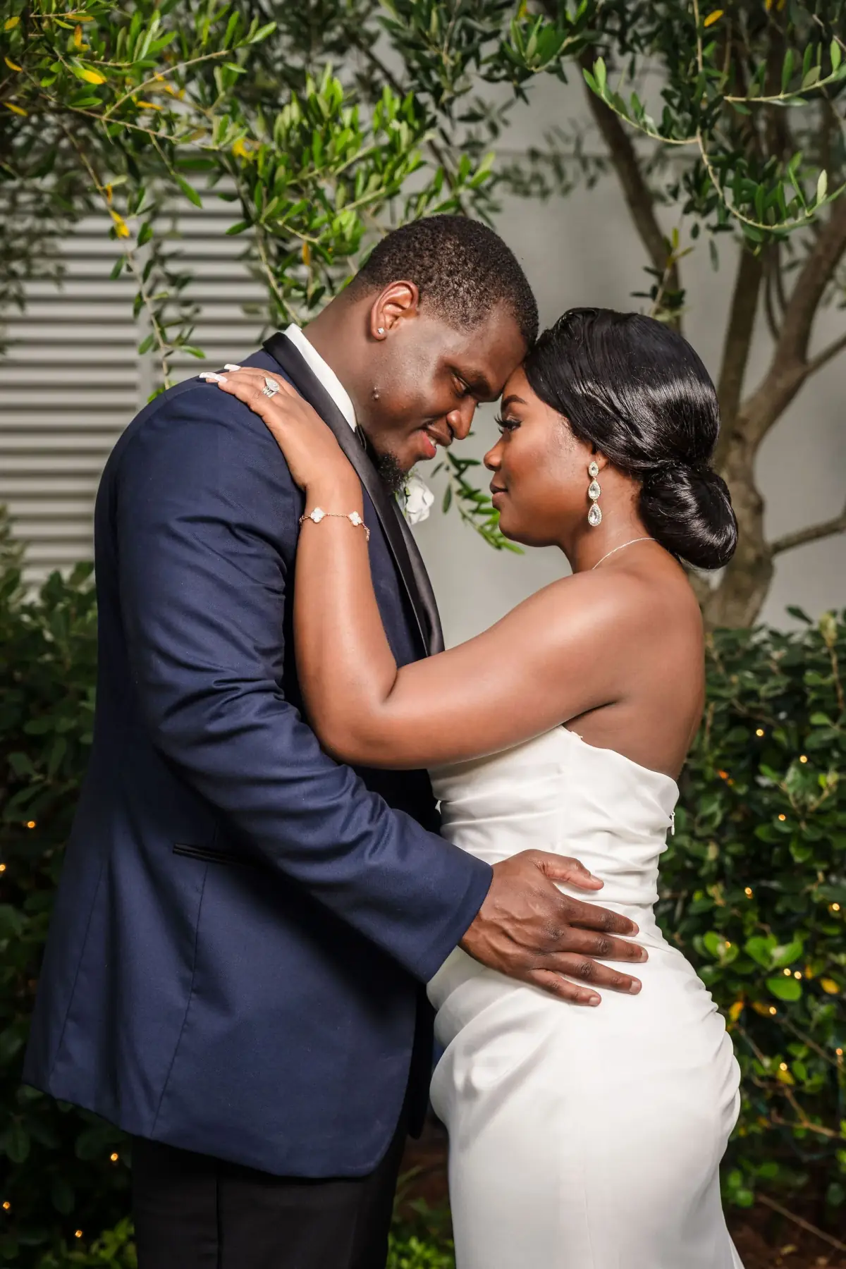 Couple embracing in the greenery