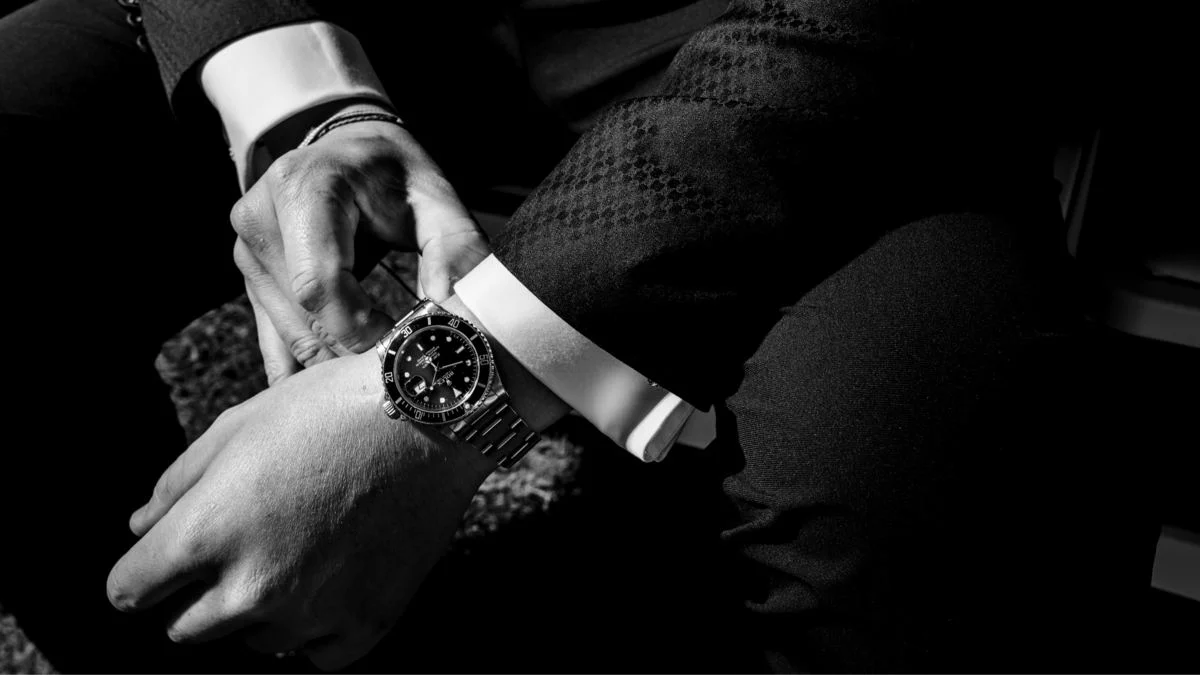 Black-and-white watch and cufflink detail