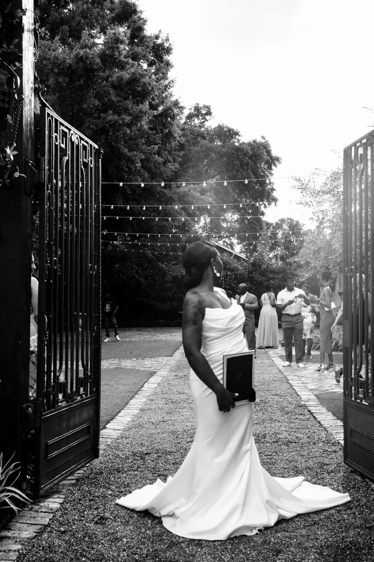 Black-and-white couple walking the gates