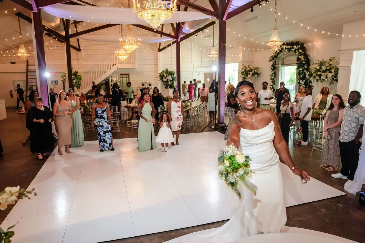 Reception on a white floor beneath the pavilion