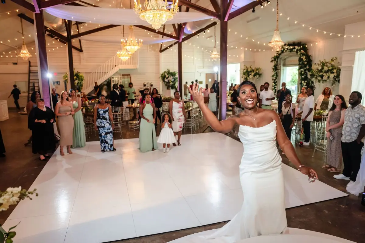 Reception on the white floor beneath the pavilion