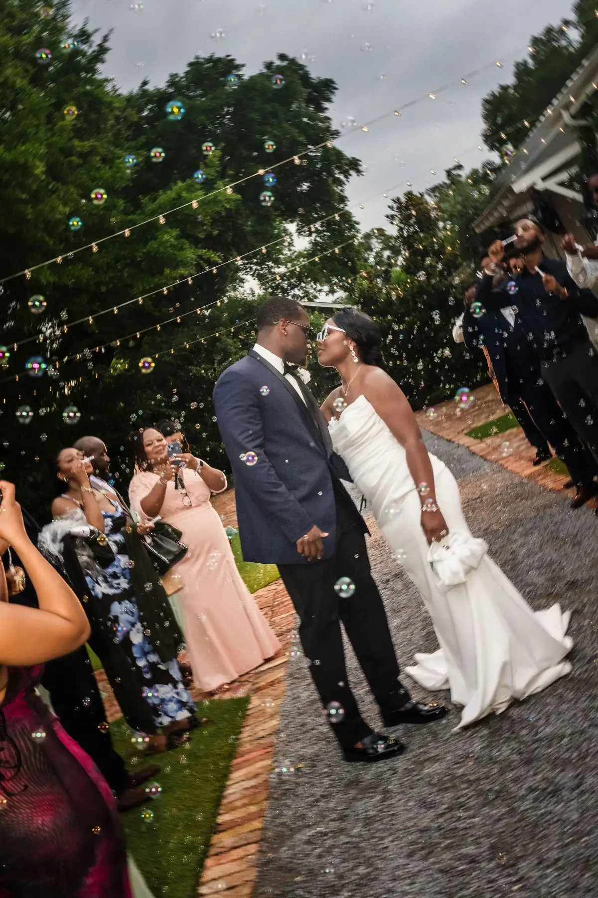 Couple walking through the evening reception