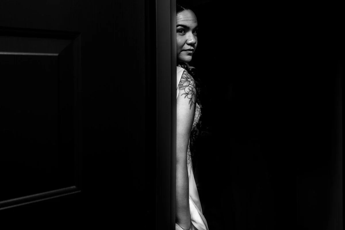 Quiet black-and-white portrait in shadow