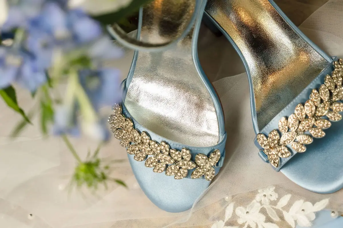 Close-up of embellished blue wedding heels