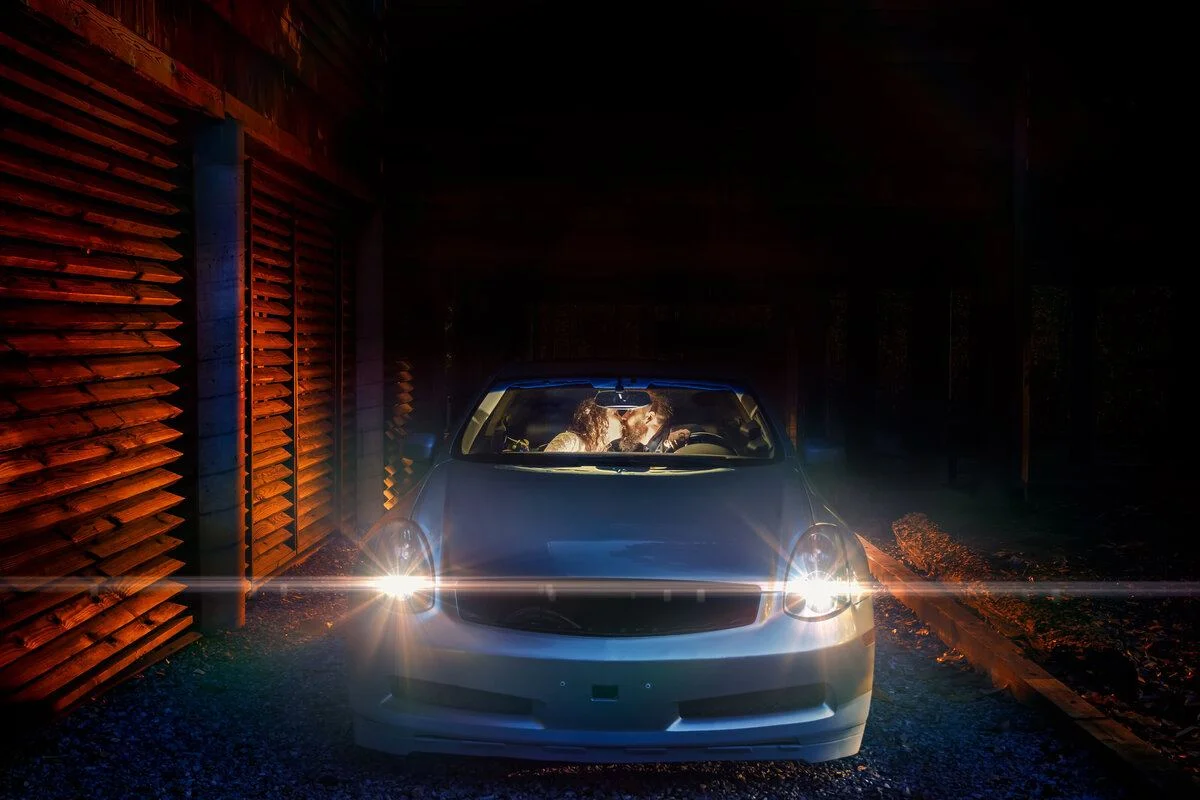 Headlights cutting through the dark