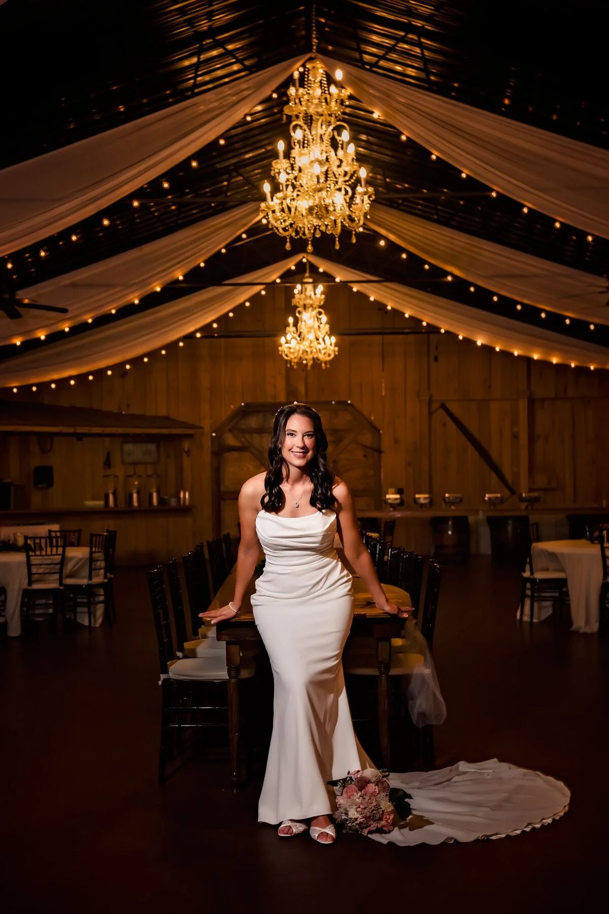 Bride in a sleek gown in warm light