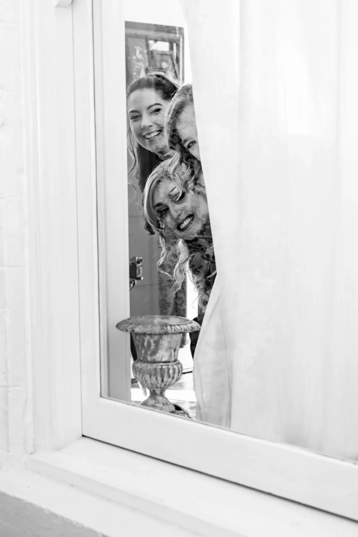 Reflection caught in an antique mirror, black and white