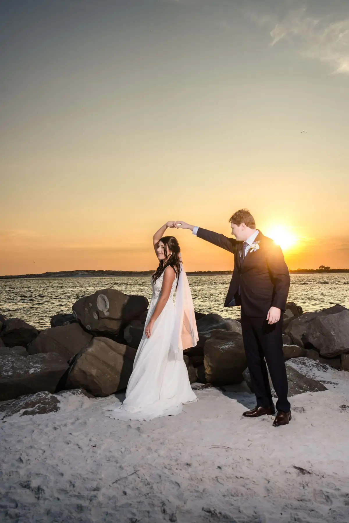 Sunset embrace at the edge of the water