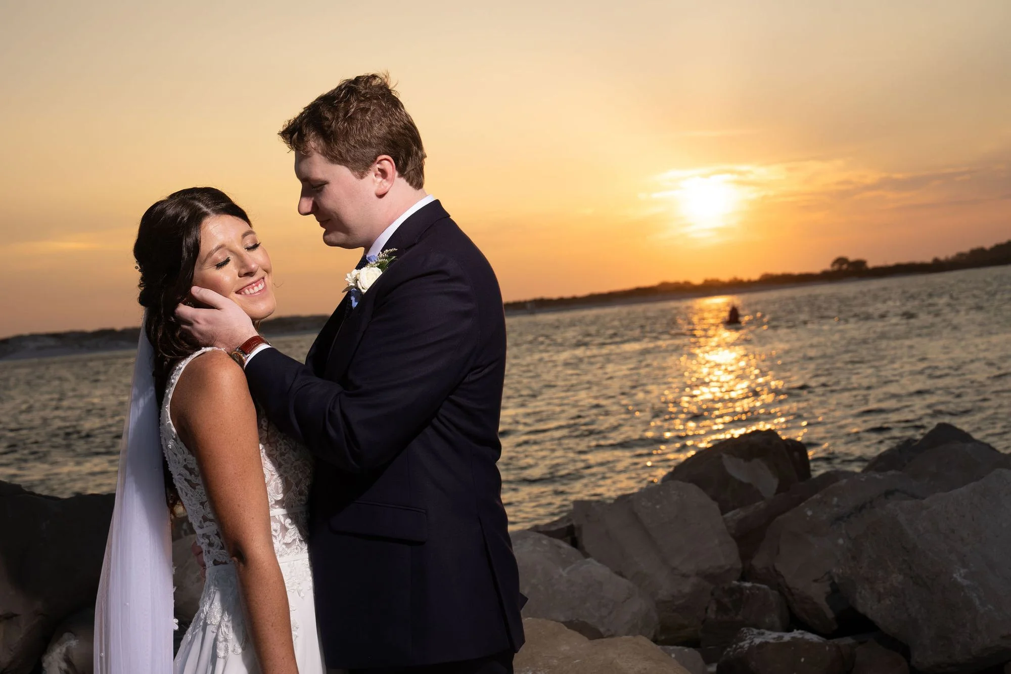 A kiss as the sun melts into the Gulf