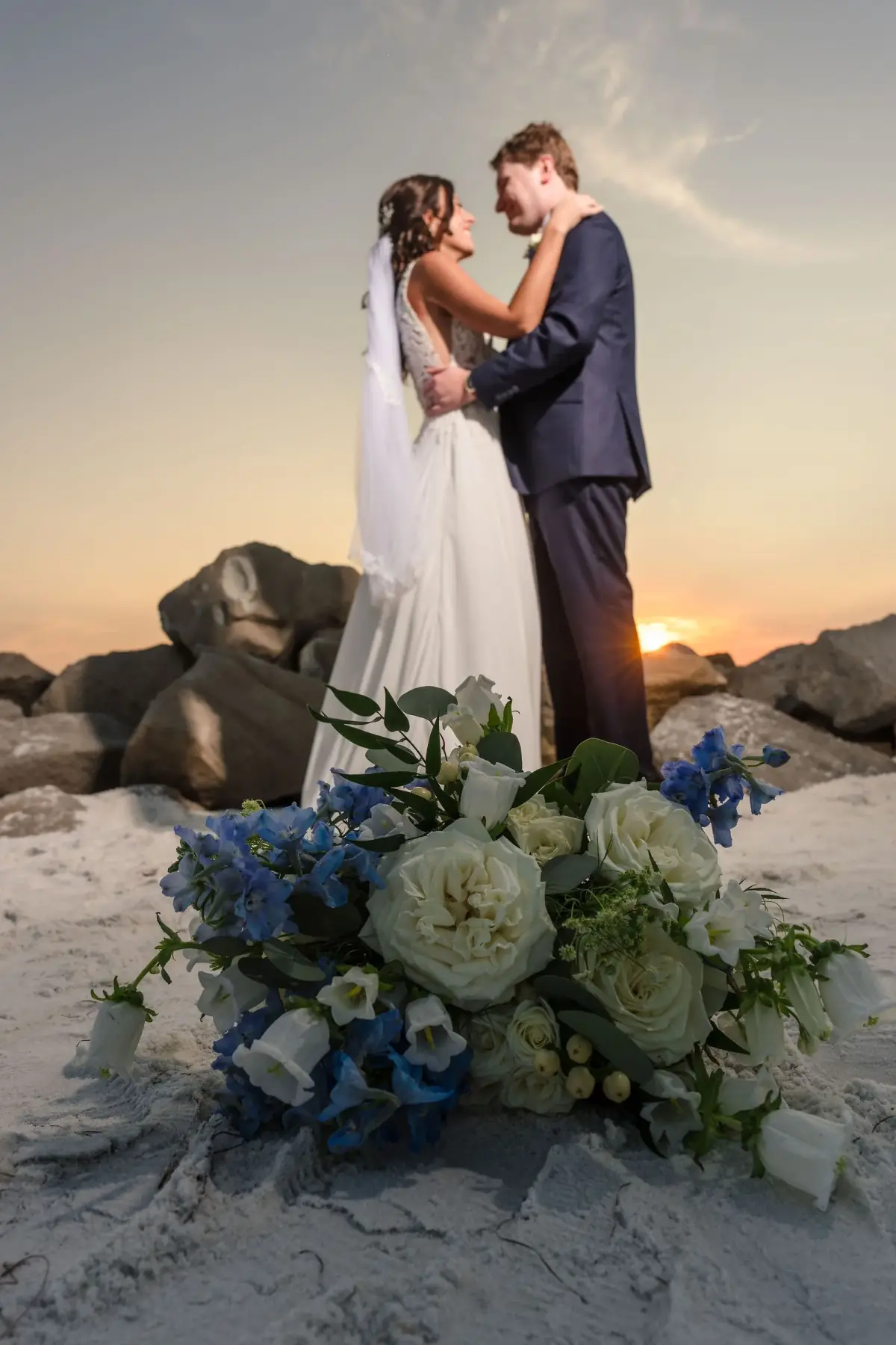 Vows shared on a platform dressed in blue florals